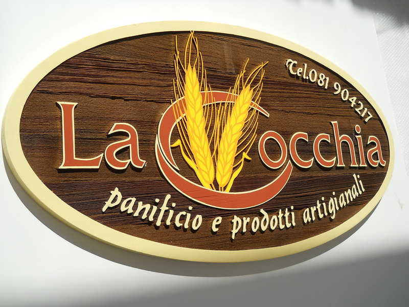 Legno Naturale – esempio dal portfolio La Fabbrica delle Insegne